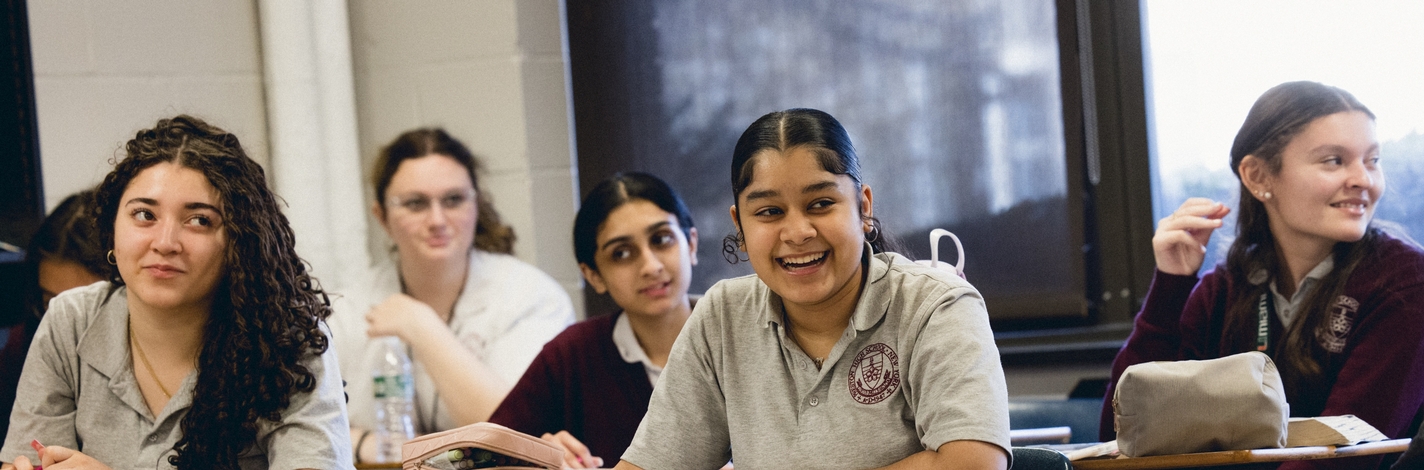 Students in Class Smiling